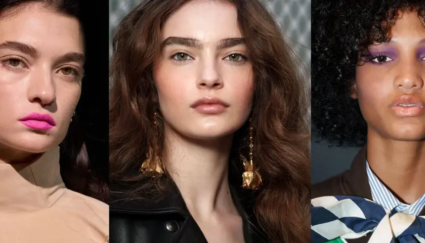 Drei Models mit auffälligem 90s makeup: knalliger Lippenstift, voluminöse Haare und glänzende Lippen.