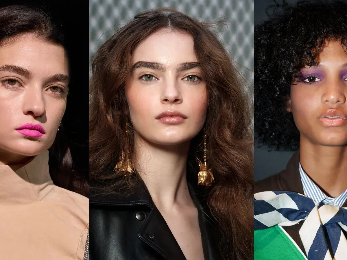 Drei Models mit auffälligem 90s makeup: knalliger Lippenstift, voluminöse Haare und glänzende Lippen.
